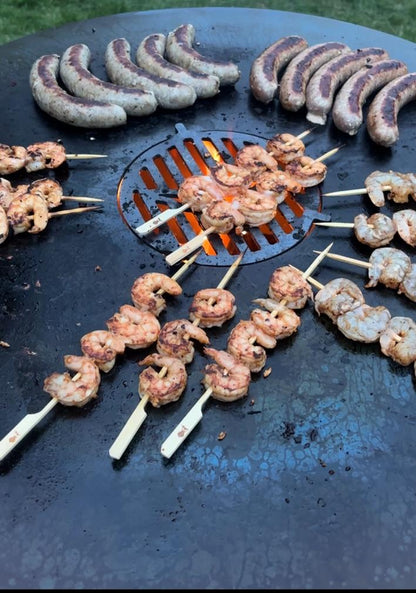 Feuertonne mit Planchaplatte und Grillfunktion